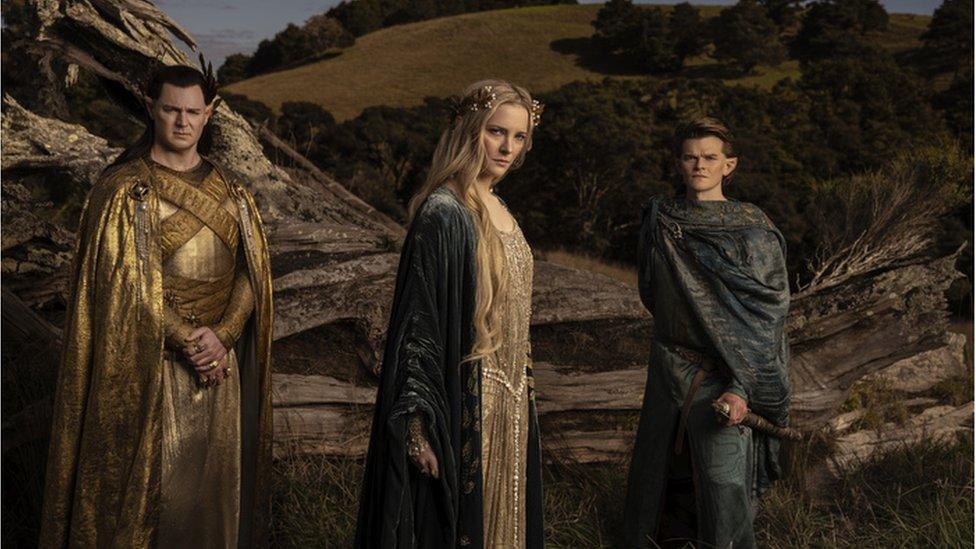 Benjamin Walker as High King Gil-galad, alongside Morfydd Clark's Galadriel and Elrond, played by Robert Aramayo