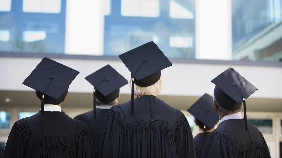 Graduates wearing caps and gowns