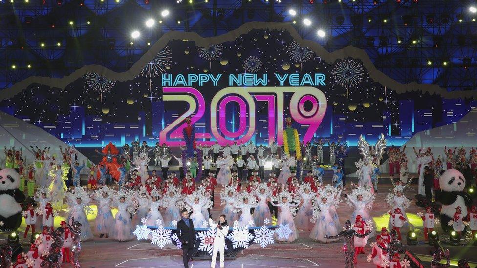 Chinese people celebrate during a New Year's Eve ceremony in Beijing, China, 31 December 2018