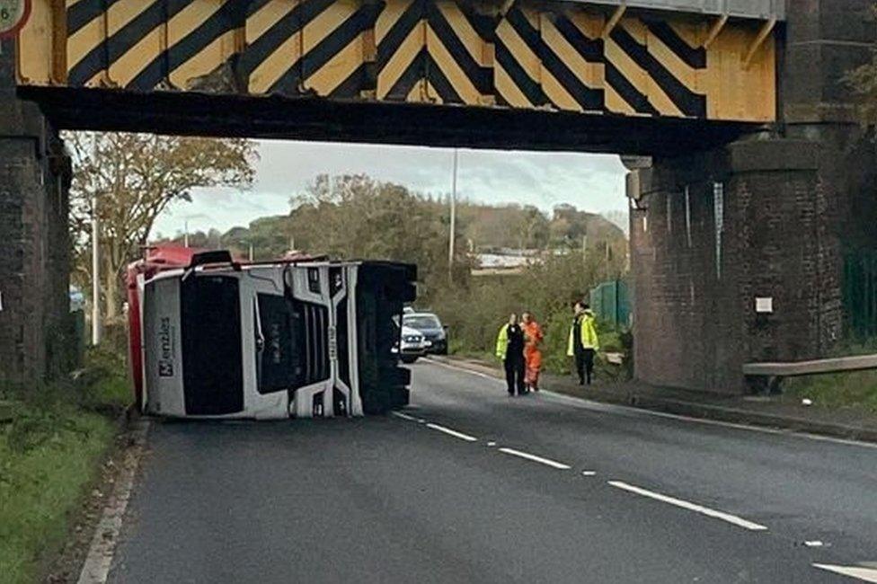 Lorry under bridge in Melton Road, Tollerton