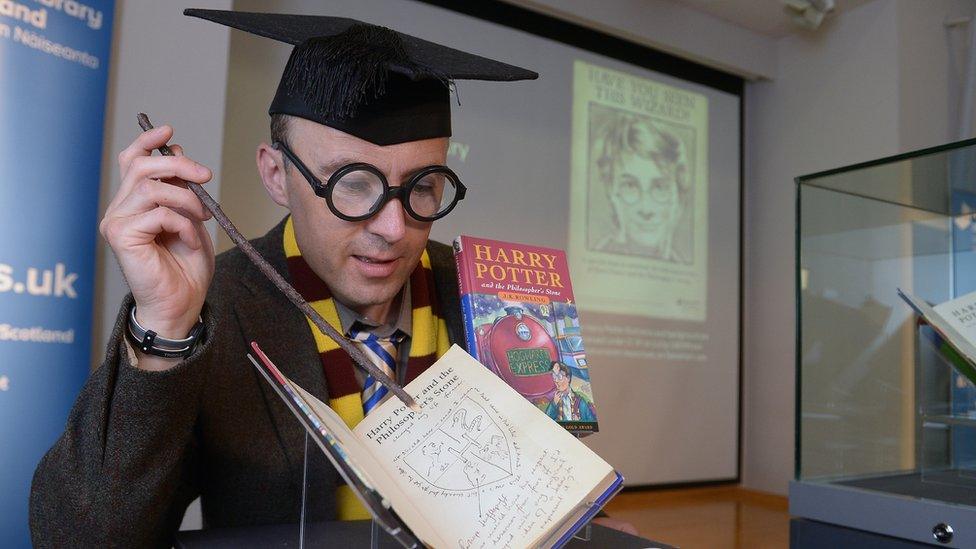 Man with Harry Potter Book.