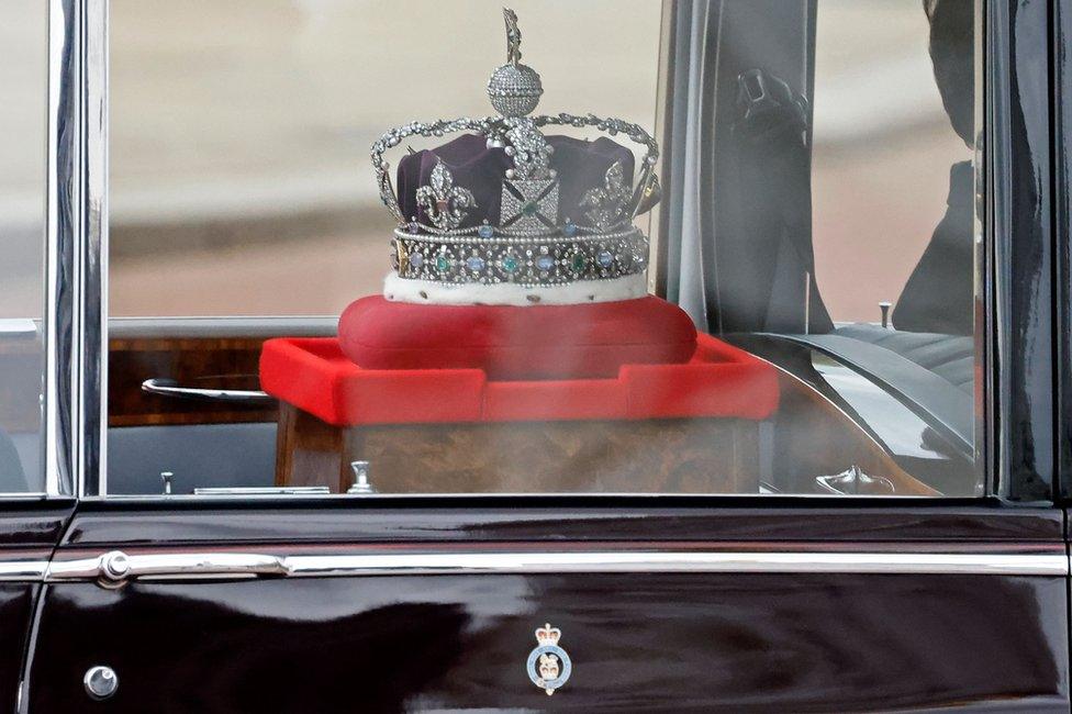 The Imperial State Crown is driven from Buckingham Palace to the Houses of Parliament for the State Opening of Parliament in London on 11 May 2021