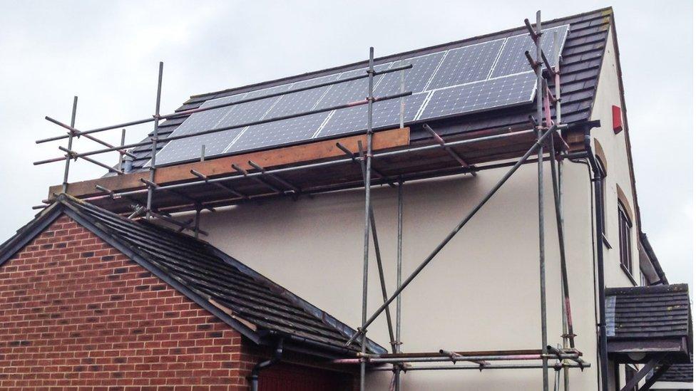 Generic solar panel being fitted to a roof