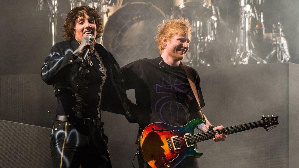 Oli Sykes of Bring Me the Horizon and Ed Sheeran during their performance on Saturday