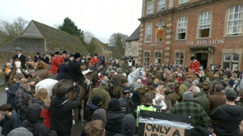 Anti-hunt protestors and members of the Avon Vale Hunt clashed outside The Red Lion pub in Lacock, at about 11:00 GMT