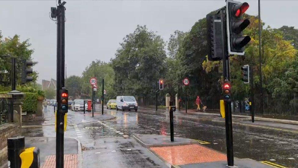 Traffic lights showing red with cycle lane lights also on red