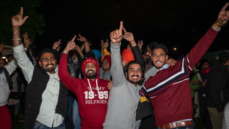 People celebrating at the park