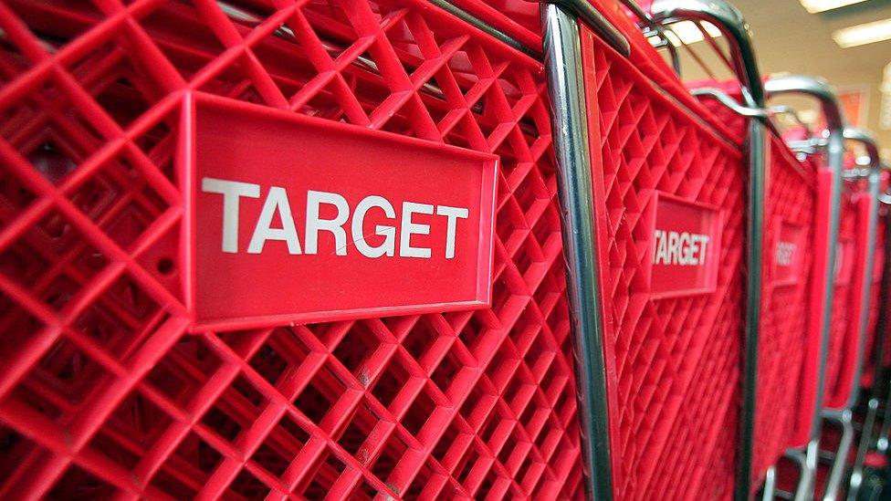 Shopping carts sit inside a Target store