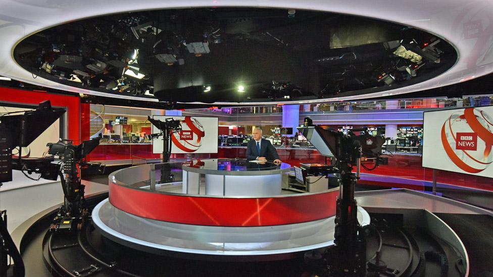 Huw Edwards presenting BBC News