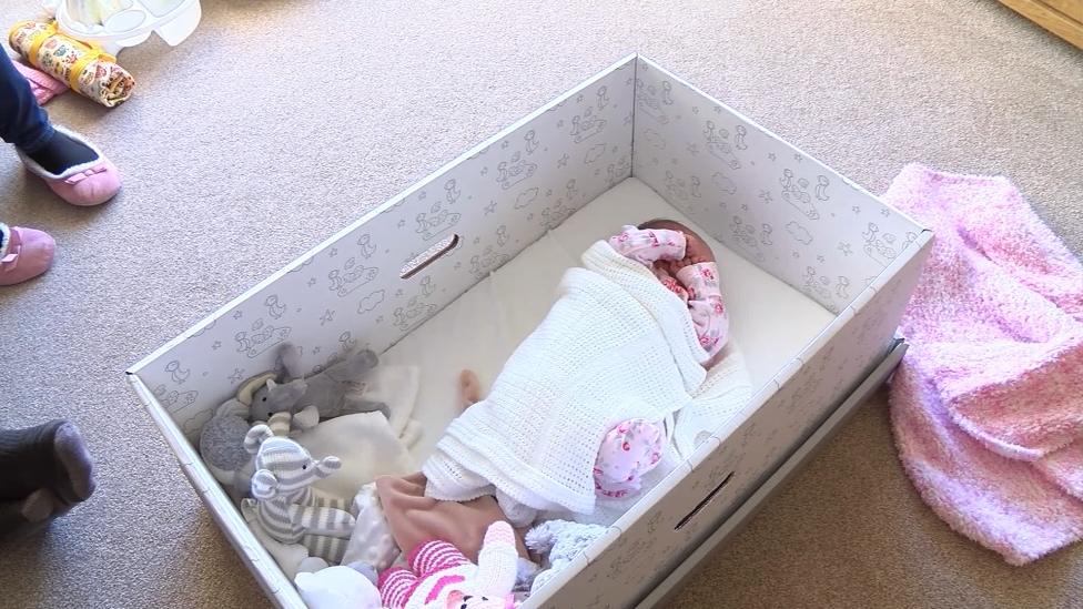 The baby box contains 50 different items for the first year of a child's life