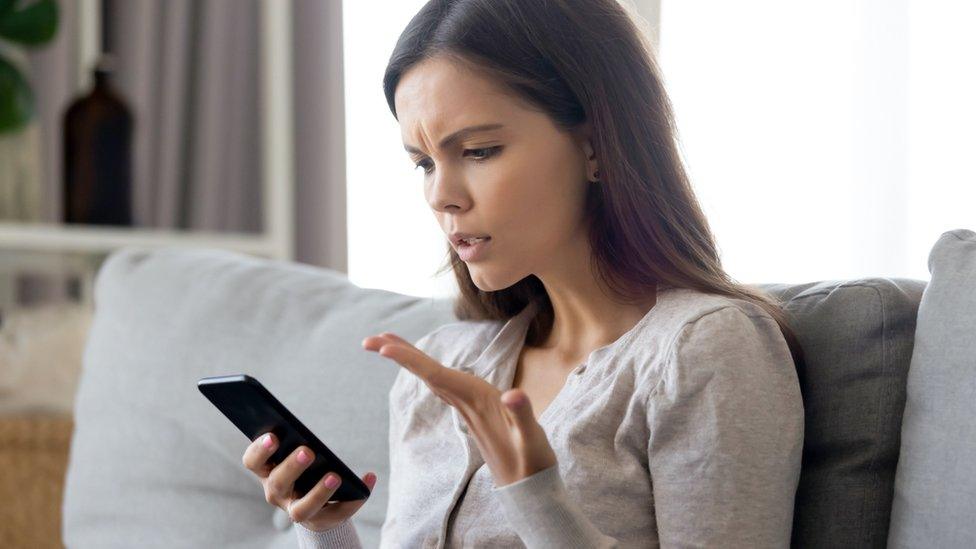 Woman looking at phone