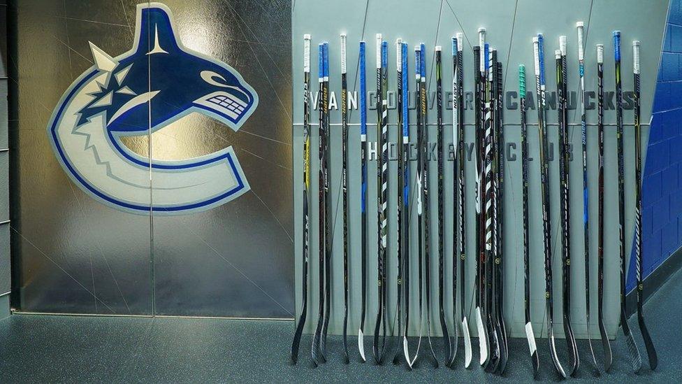 A Twitter picture featuring hockey sticks left outside. Caption: "We've left a few of these outside the dressing room tonight. #PutYourSticksOut"