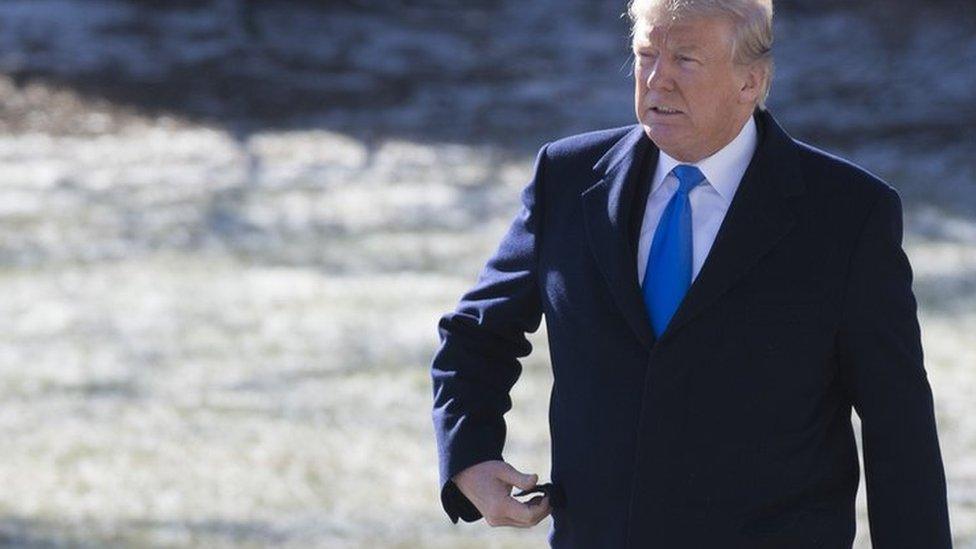 US President Donald Trump walks to Marine One prior to departing from the South Lawn of the White House in Washington, DC, January 5, 2018