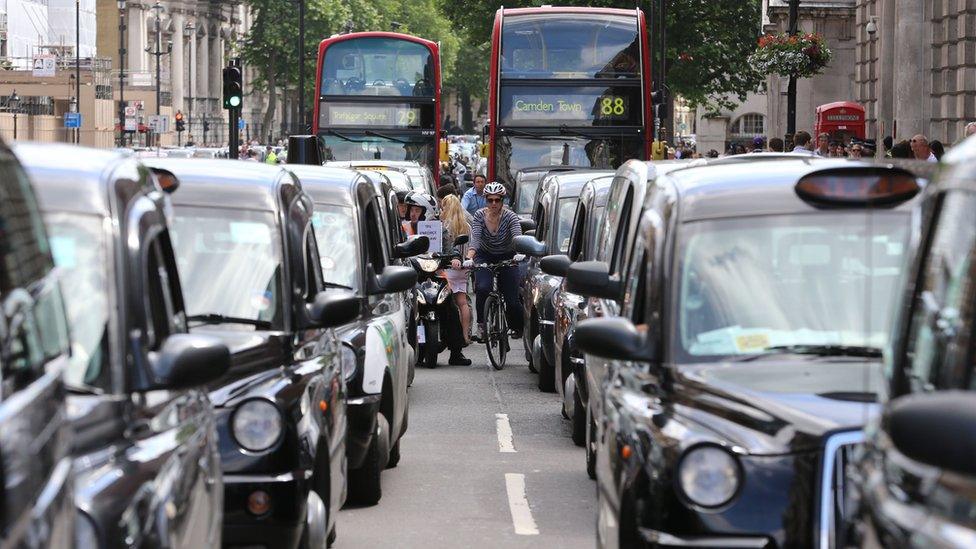 Taxi blockade London's Whitehall over the introduction of Uber in 2014