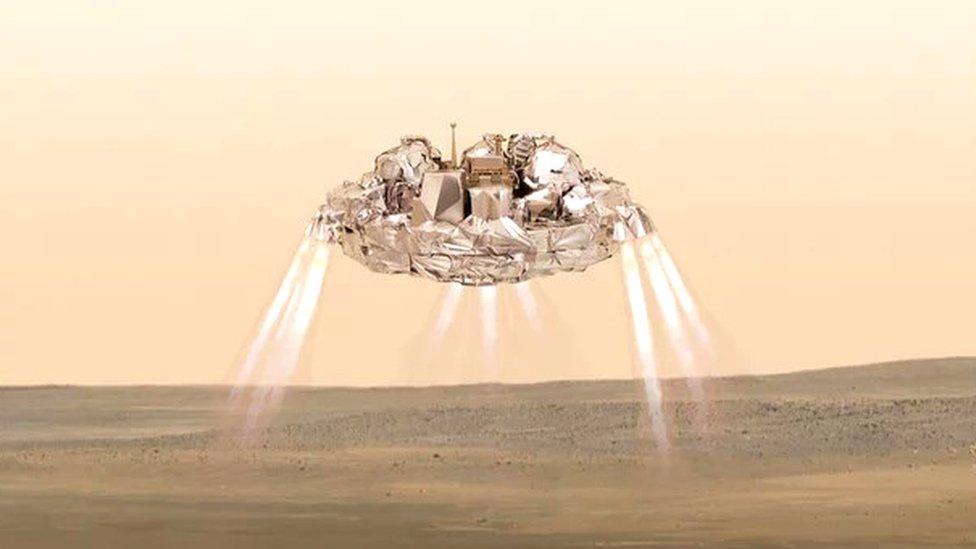 Artist's impression of how the lander will look as it descends to Mars