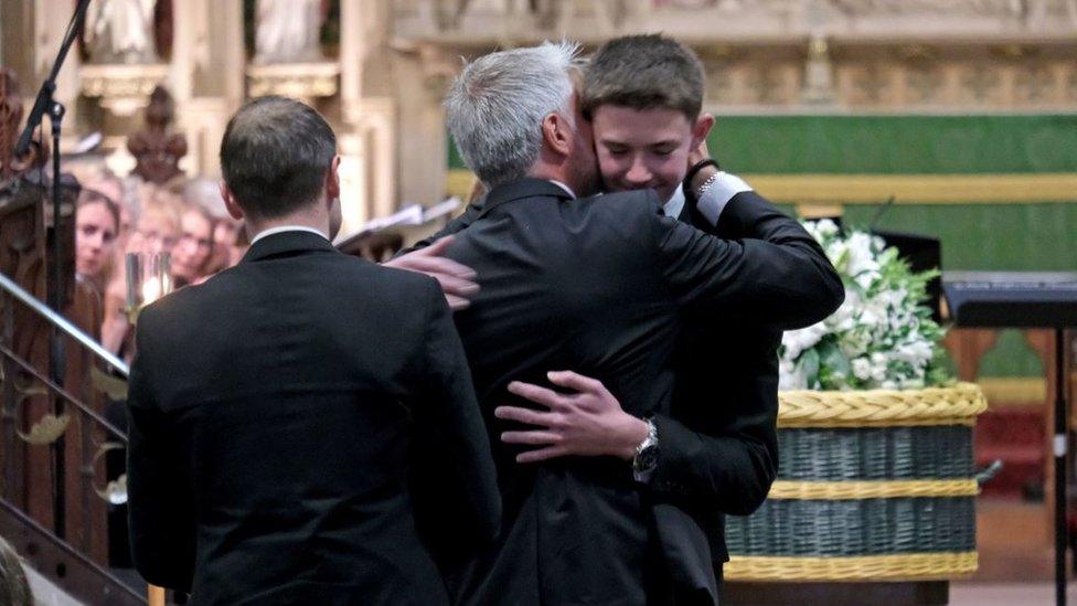 Dad David Webber hugging his son Charlie Webber