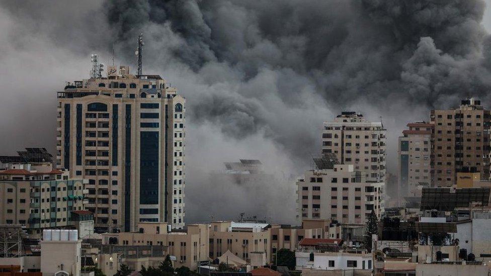 Smoke rises following an Israeli air strike on Gaza City, 09 October 2023.