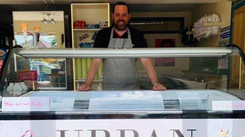 Luke Daniels inside his shop