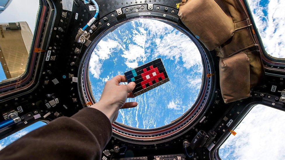 Invader art on the International Space Station, image released 11 March 2015