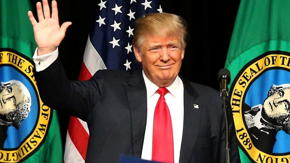 Donald Trump waves during a campaign rally in Spokane, Washington, 7 May 2016.