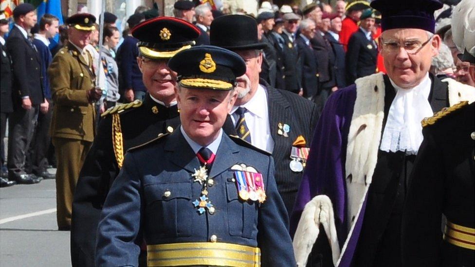 Air Marshal Peter Walker inspecting the parade on Liberation Day 2013, behind him is ADC Major Marco Ciotti, and right is Bailiff, Sir Richard Collas