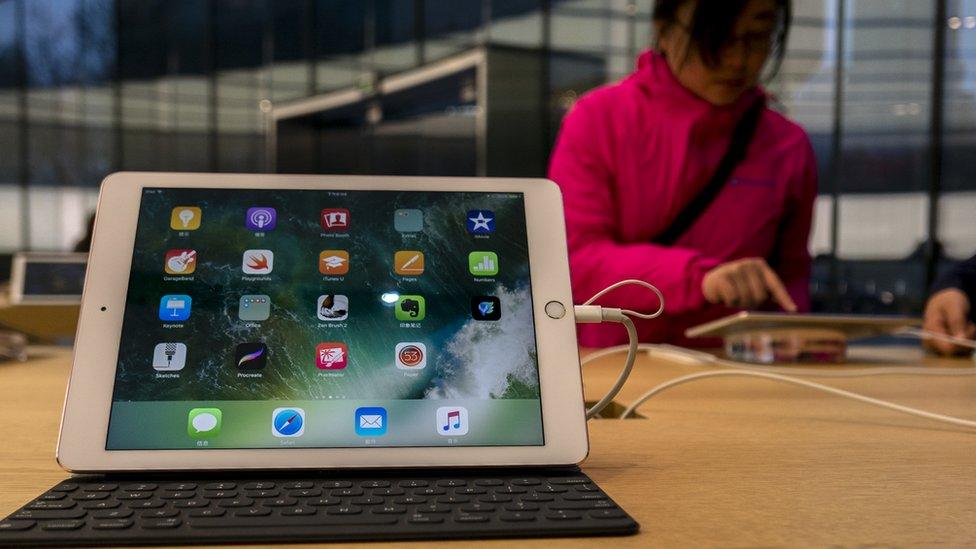 Woman used iPad at Apple store