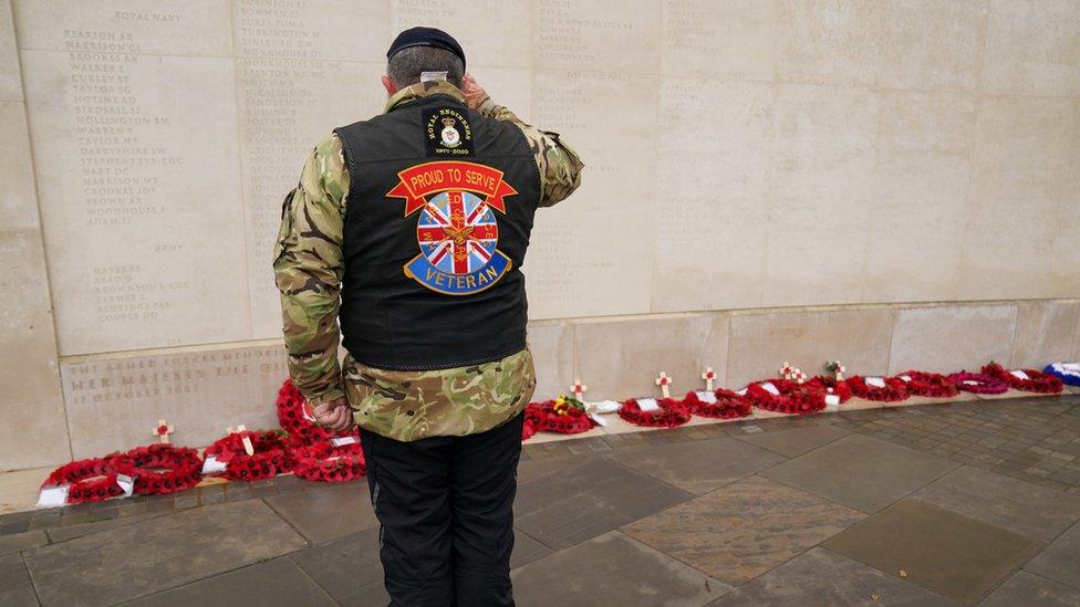 Motorcyclist at memorial wall