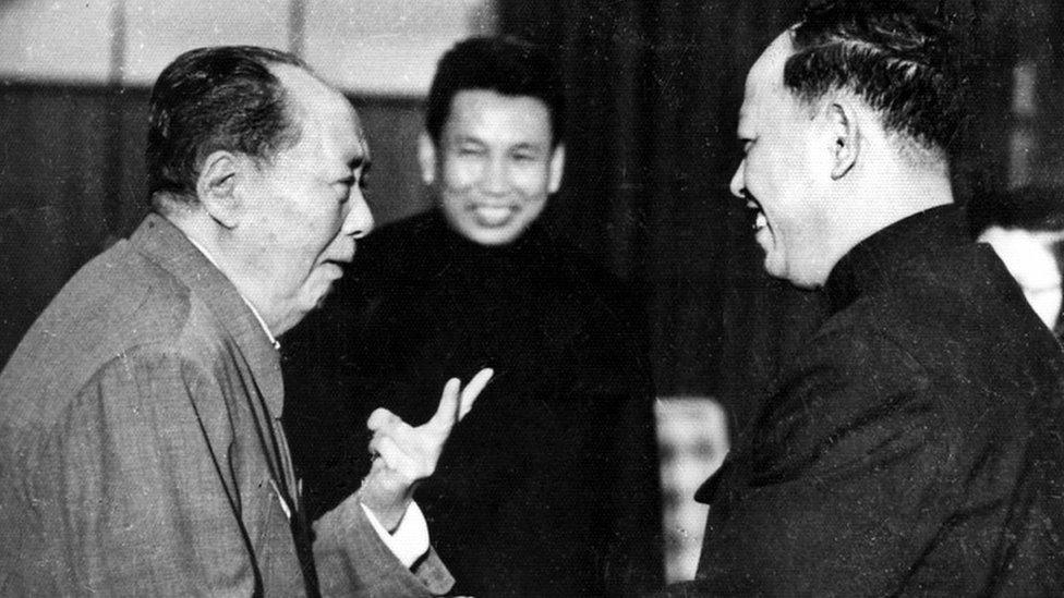 :A photo taken in the 1970"s outside of Cambodia, shows China"s chairman Mao Zedong (1893 - 1976) (L) greeting top Khmer Rouge official Ieng Sary (R), also known as " brother number three", while Khmer Rouge leader Pol Pot (C) looks on.