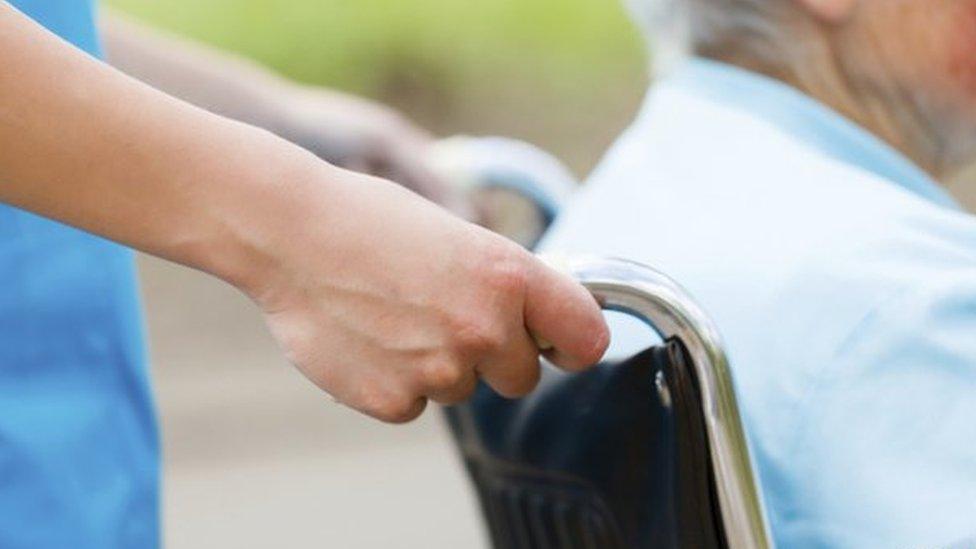 A nurse with a patient (stock image)