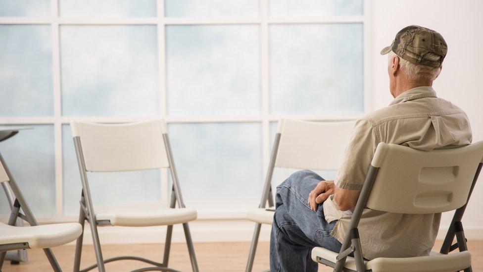 Man sitting in chair