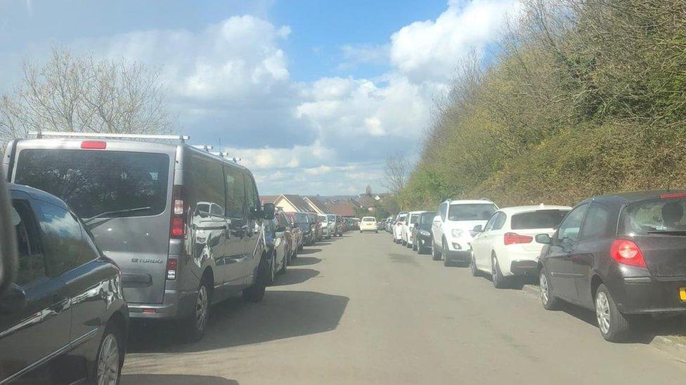 A street in Margam clogged up with cars