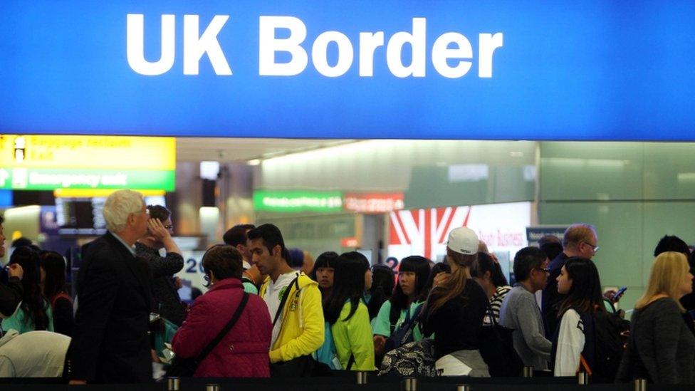 Passengers at the UK Border at Heathrow Airport