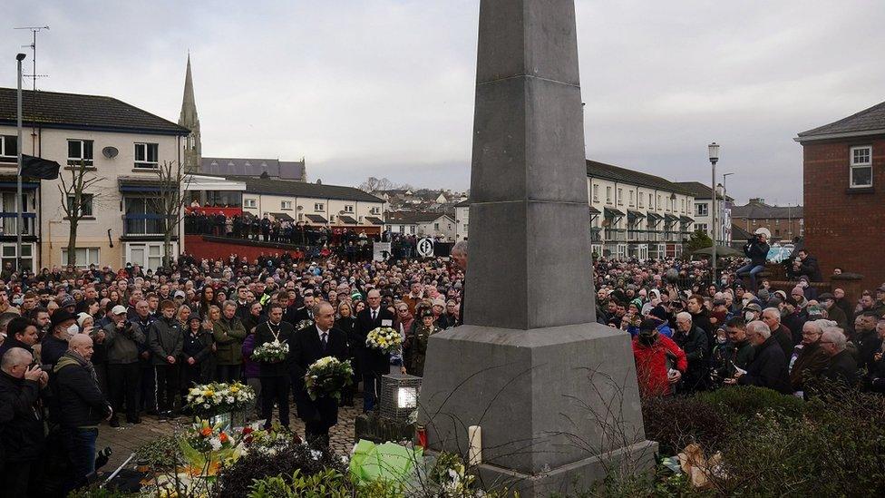 Wreaths are placed at the Bloody Sunday memorial during an event to mark the 50th anniversary