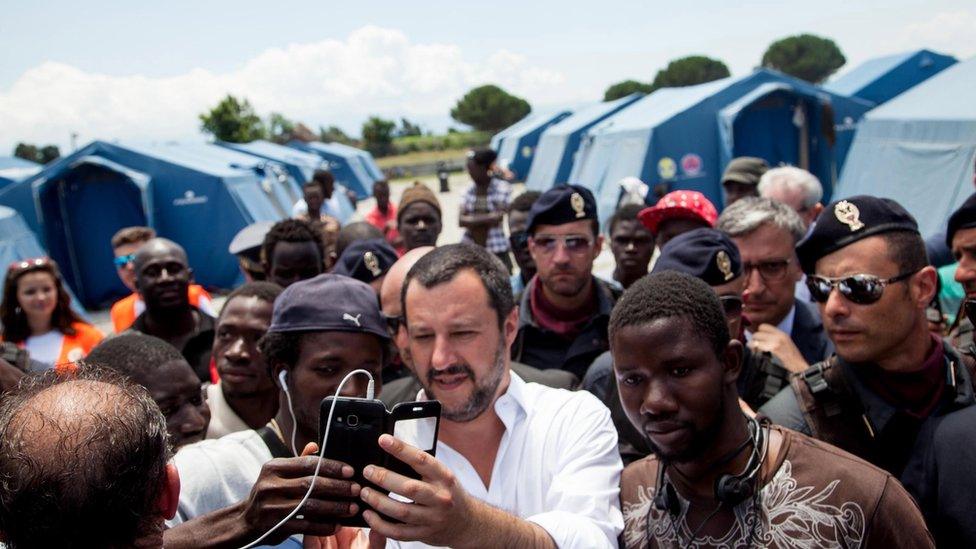 Italian Interior Minister, Matteo Salvini (C) visits a migrants" tent city in San Ferdinando - 10 July 2018