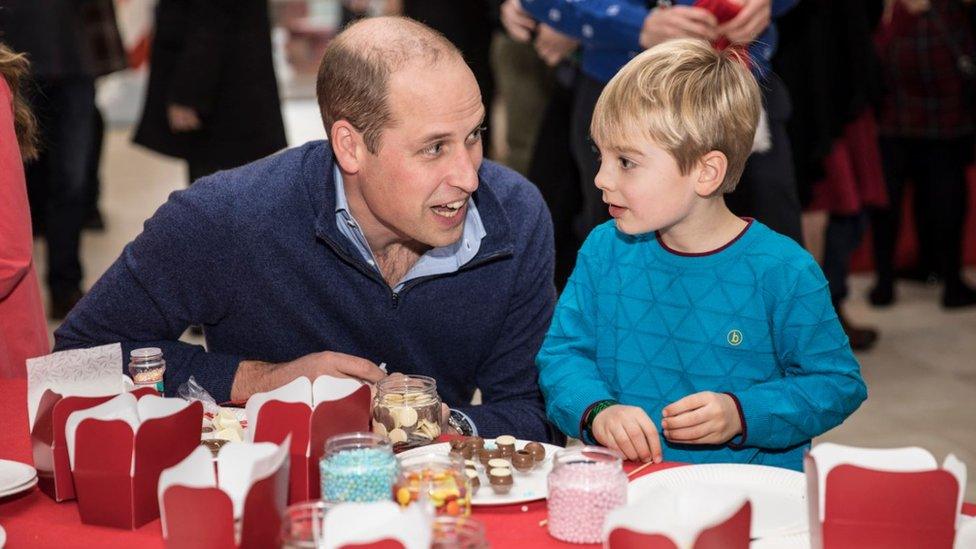 The Duke of Cambridge talks with five years old Harry O'Grady at Kensington Palace