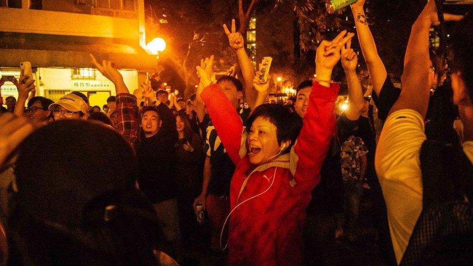 Hong Konger celebrating on election night