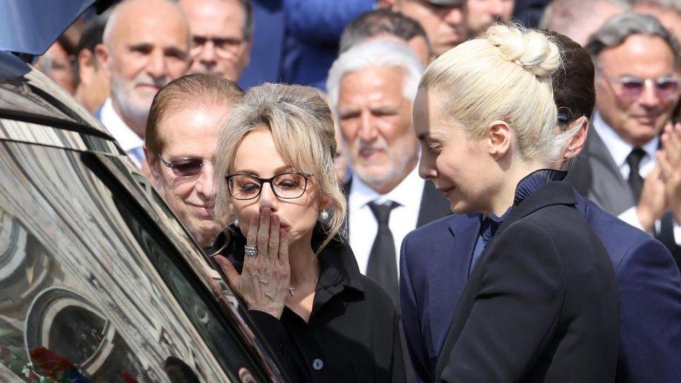 Marina Berlusconi and Marta Fascina greet the coffin of Italy's former prime minister and media mogul Silvio Berlusconi outside the Milan Cathedral (Duomo) at the end of the state funeral in Milan, Italy, 14 June 2023