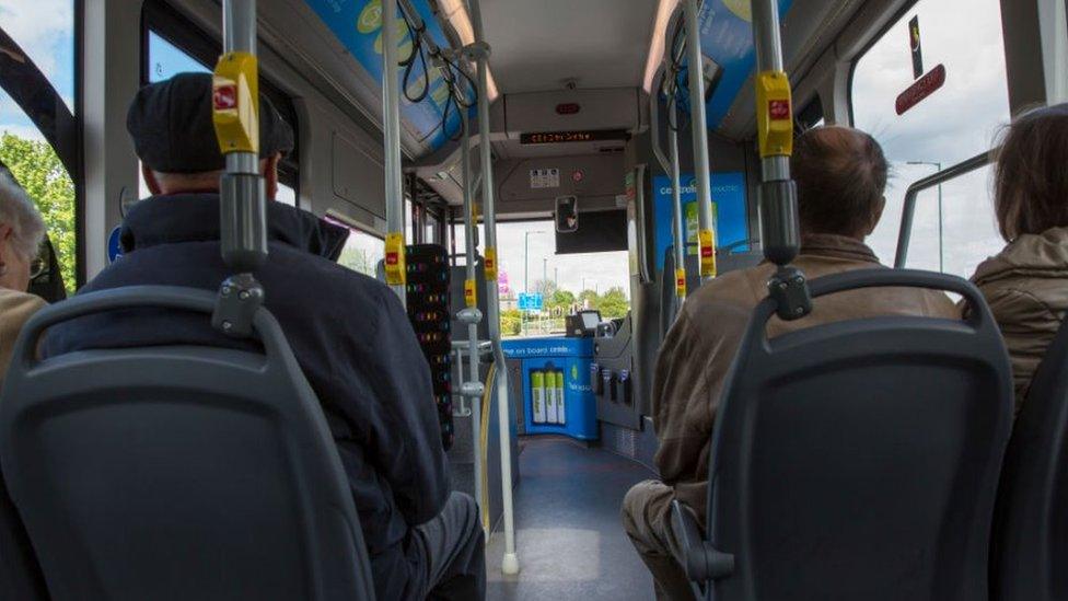 Passengers on a bus