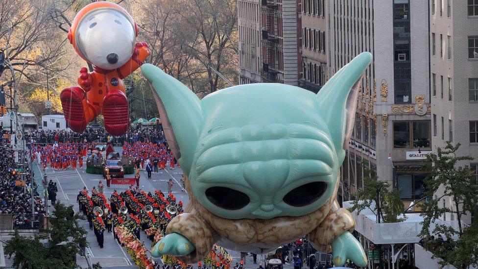 Baby Yoda balloon flies during the 95th Macy's Thanksgiving Day Parade in Manhattan