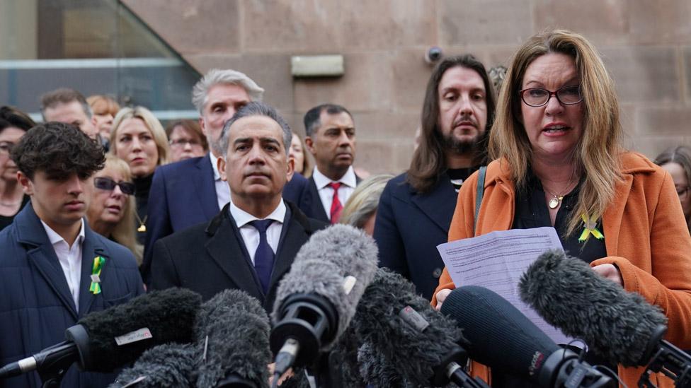 Emma Webber, mother of Barnaby Webber making a statement alongside relatives of the victims, outside Nottingham Crown Court