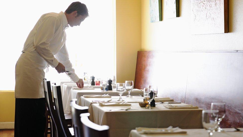 A waiter in a restaurant