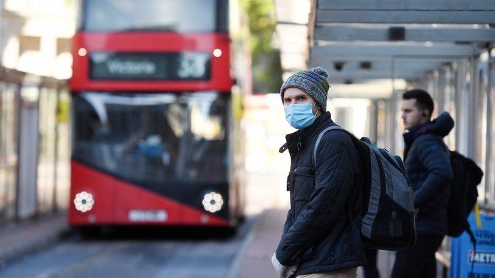 Commuter wearing mask