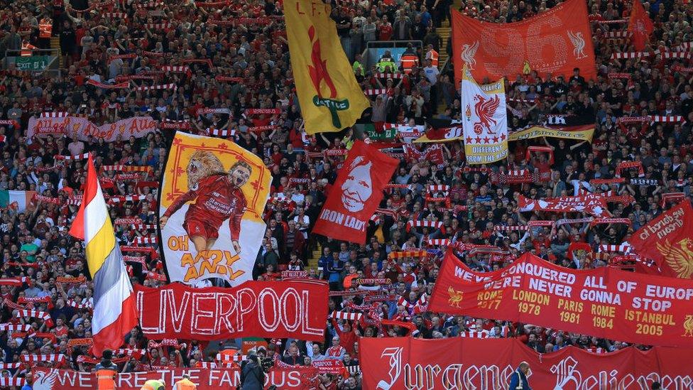 Fans in the Kop in 2019 wave banners including one which reads Iron Lady in recognition of Hillsborough campaigner Anne Williams. Another says 96 in tribute to the fans at that point officially recognised as having lost their lives in the disaster