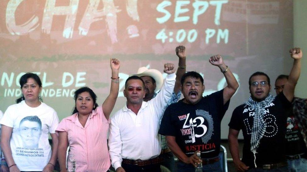 Relatives of the 43 students missing from Ayotzinapa College Raul Isidro Burgos gestures during a news conference about of the resignation of Tomas Zeron, Mexico"s Federal chief of investigations from the Attorney General"s Office at the Miguel Agustin Pro Juarez Human Rights Center in Mexico City, Mexico, September 15, 2016.