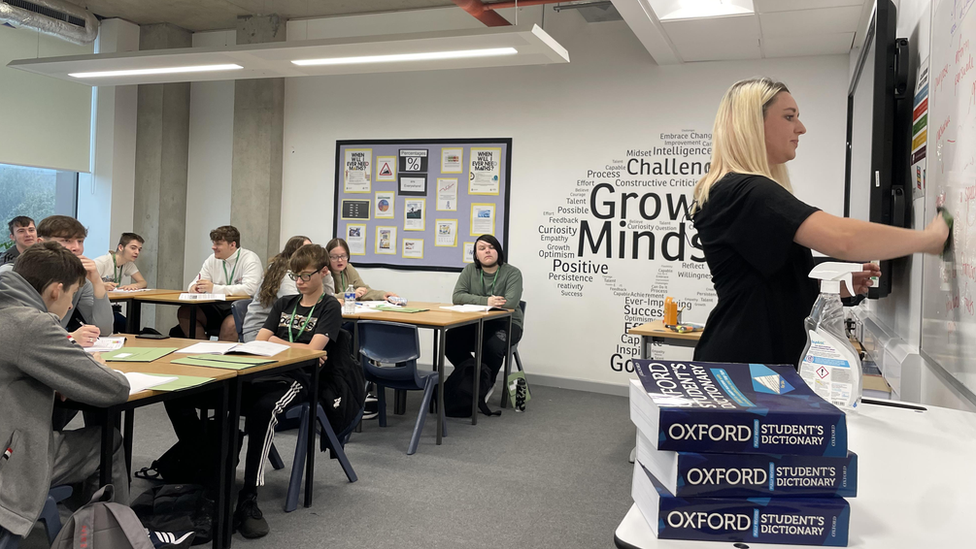 Teacher with a class of students at Leeds City College