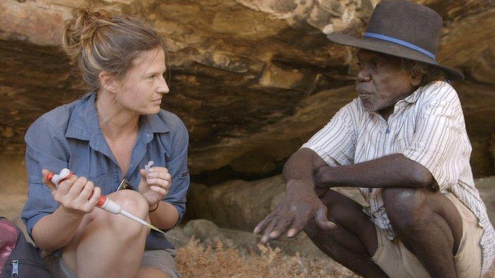 Scientists Dr Elspeth Hayes (left) with Mark Djandjomerr (centre) and May Nango (right) at the dig site