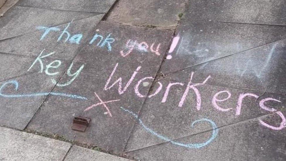 Chalk thank you message on the pavement