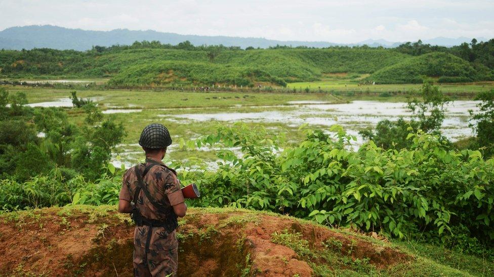 A Bangladeshi border guard at the Bangladesh-Myanmar frontier near Rakhine, 26 August