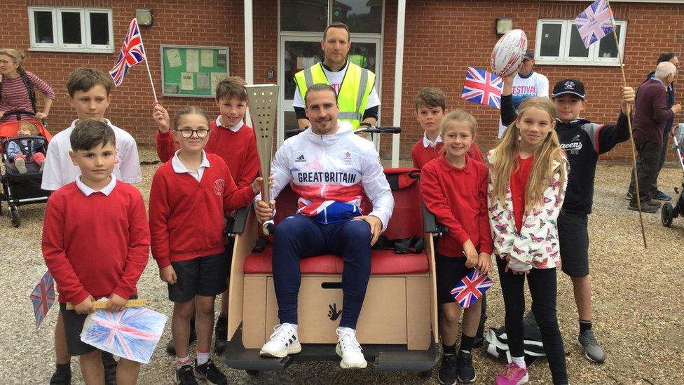 Holbrook Primary School children with Rugby 7s Olympic athlete, Ethan Waddleton, who lives in Holbrook