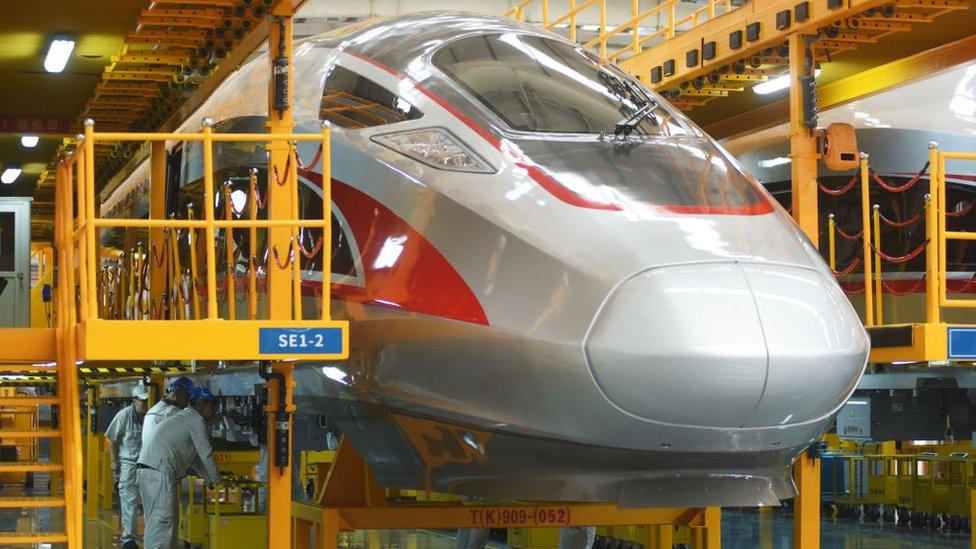 China's Fuxing high-speed bullet trains at the manufacturing line of CRRC Qingdao Sifang